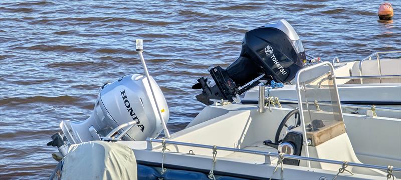 Outboard engines tilted up - photo © Mark Jardine