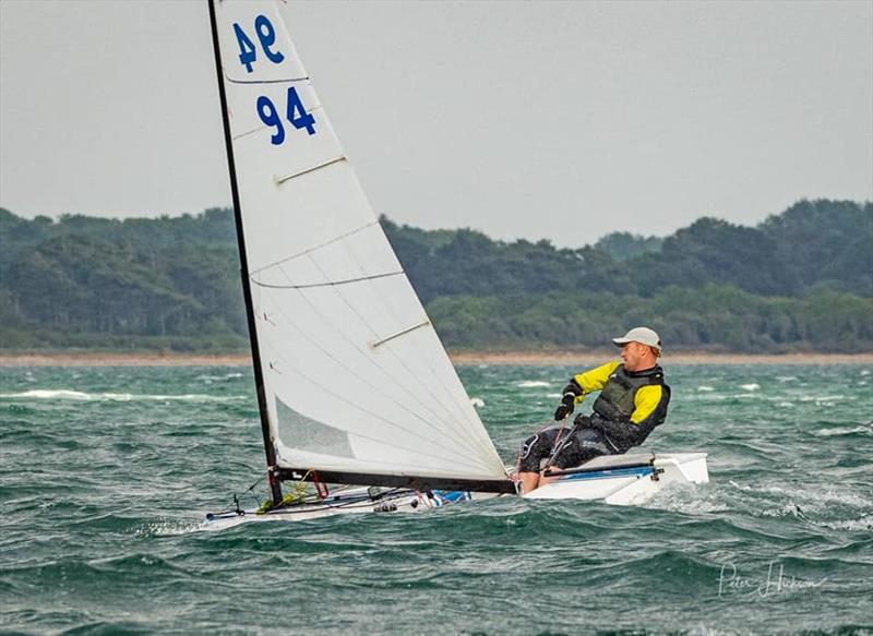 Andrew Mills  during the OK Open at HISC photo copyright Peter Hickson taken at Hayling Island Sailing Club and featuring the OK class