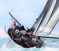 Alex Thomson brings Hugo Boss to Jersey © Debbie Brown