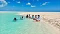 A picnic on Turtle Island where the sand is soft and the water is crystal clear