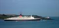 The Cunard liner QE2 sailing past Roche's point, following her last ever visit to Cobh