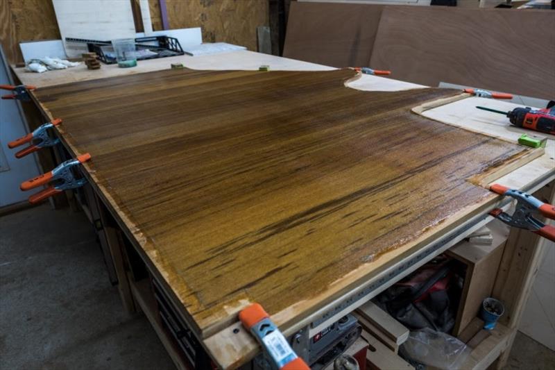 Lamination of teak floor for the master head - photo © Bayliss Boatworks