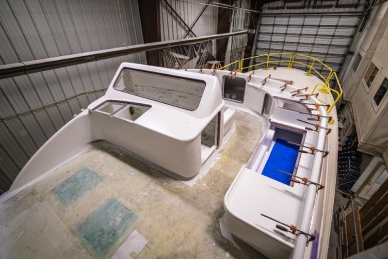 Flybridge console is primed, while clamps set the curtain track to the exterior of the bridge - photo © Bayliss Boatworks
