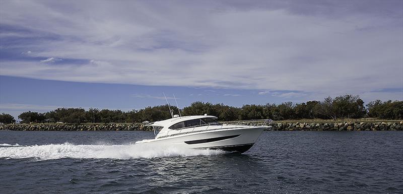Riviera's 395 SUV easily cruises at 27 knots in flat water and will make just over 30 knots no problem photo copyright John Curnow taken at  and featuring the Power boat class