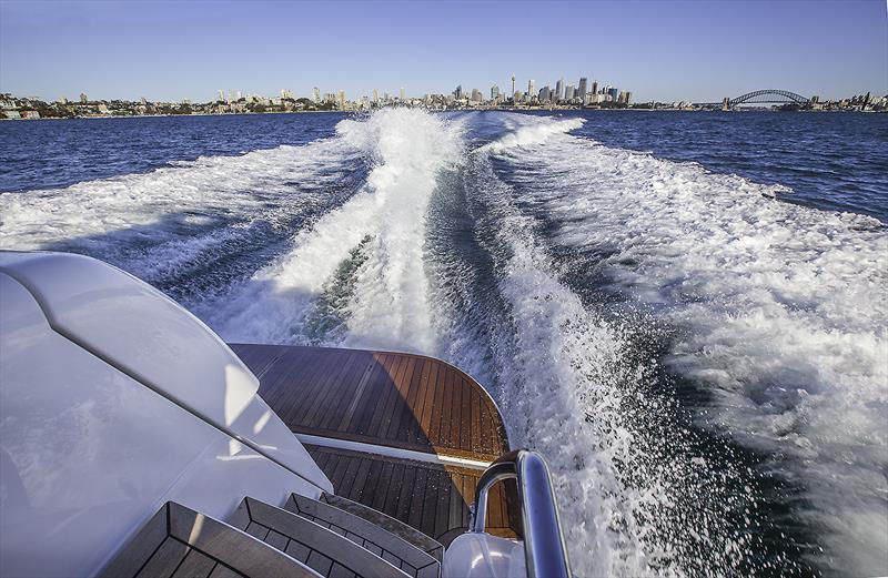 Running down the Harbour on board Maritimo's X60 - photo © John Curnow