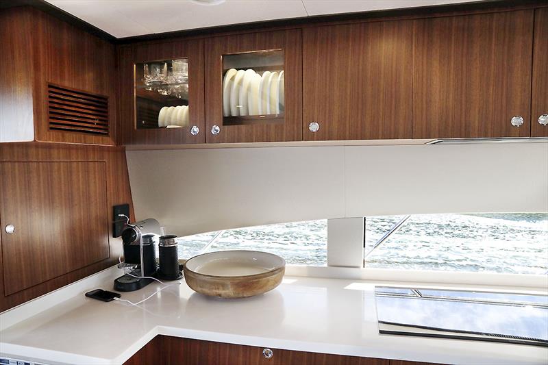 Crockery cabinet in the galley of the Longreef 60 SX photo copyright Jennifer McKinnon taken at  and featuring the Power boat class