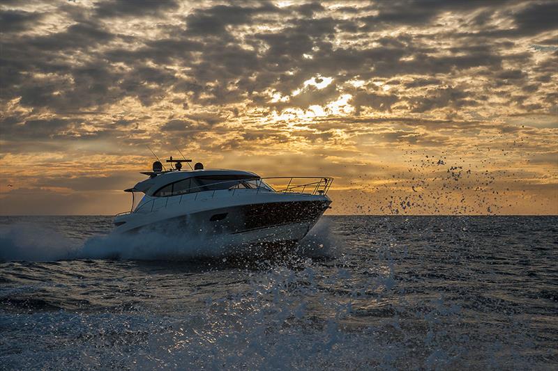 Just enough light around to know that this is the hugely popular Riviera 6000 Sport Yacht - Riviera trip Gold Coast to Sydney - photo © John Curnow