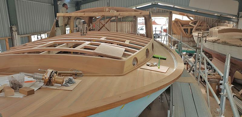 Work continues on Hull #2 of the Wooden Boat Shop's Deal Island 50 craft. - photo © Wooden Boat Shop
