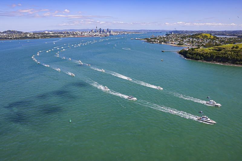 A line of Riviera luxury motor yachts as far as the eye can see heading out of Auckland Harbour - photo © Riviera Studio