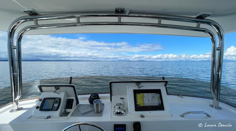 Nice enough to be up on Airship's flybridge today - Flotilla to Alaska - Day 2 - photo © Laura Domela