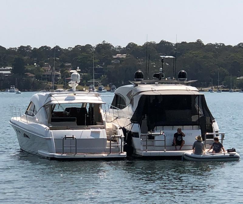 Russell and his family love rafting up with like-minded boaters - photo © Riviera Australia