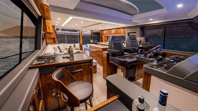 The light-filled entertainer's saloon with a fully equipped aft galley. - photo © Riviera Australia