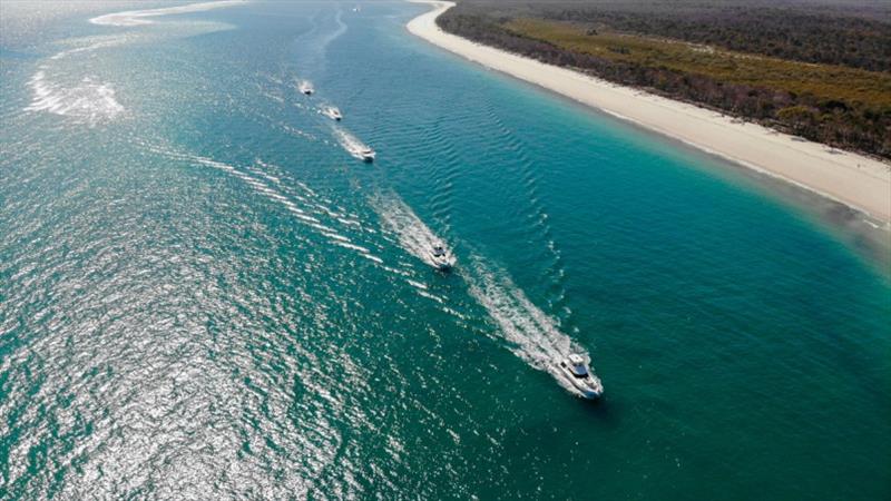 The Riviera fleet, led by the R Marine Jones team, heading north to Fraser Island for the Great Sandy Strait Experience. - photo © Riviera Australia