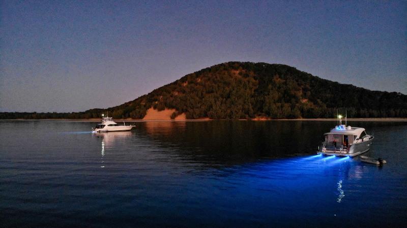 The sunsets and the location on a fantastic day of boating enjoyment and camaraderie for motor yacht owners, their families and friends at Fraser Island. - photo © Riviera Australia