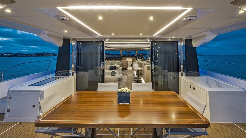 Entertaining space on the main deck of the Aquila 70 - photo © Onne van der Wal