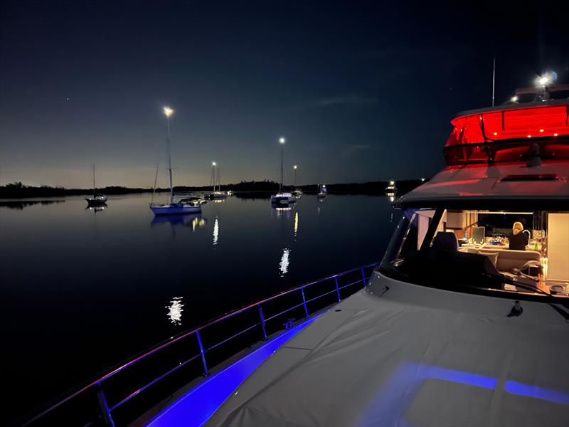 Night-time silhouettes of Luna, a motor yacht that accommodates the Surkovics, their family and friends in comfort and luxury. - photo © Riviera Australia