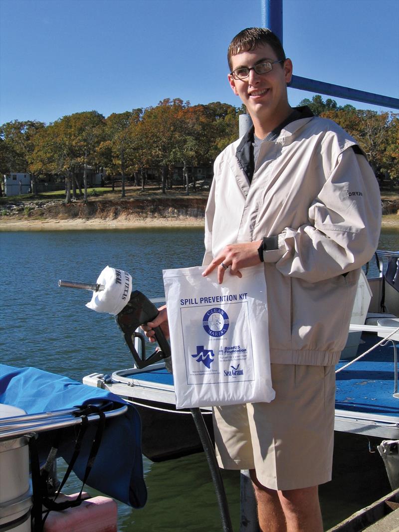 This boater has a small fuel spill kit he keeps aboard that includes an oil-sorbent “donut” to use on the fuel nozzle when filling up photo copyright Scott Croft taken at  and featuring the Power boat class