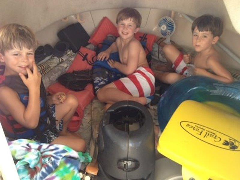 Snack time, nap time, and fort building are just some of the moments the boys enjoyed below deck on the Seafarer 226. Pictured left to right:  Alex, Jack, Bowen. - photo © Grady-White