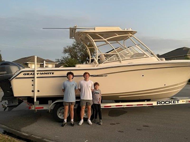 Bowen, Jack, and Henry are ready to get the Freedom 275 in the water for a day of fun! - photo © Grady-White