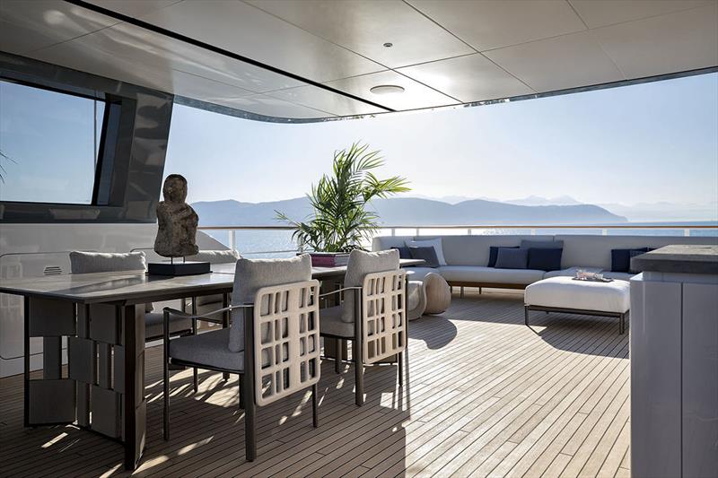 On the sun deck, the BREAK table was chosen to characterize the dining area along with the elegant ALDÌA chairs. ALDÌA poufs and low tables and the CLOP rocking chair enrich the space - Benetti B.Yond 37 M Yacht - photo © Georgetti