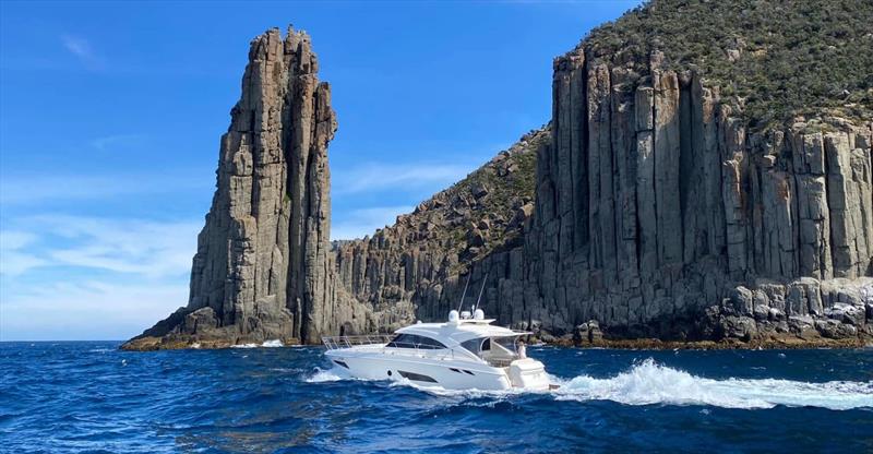 Cape Pillar near Port Arthur provides a spectacular background for Dory as she cuts through the swell - photo © Riviera Australia