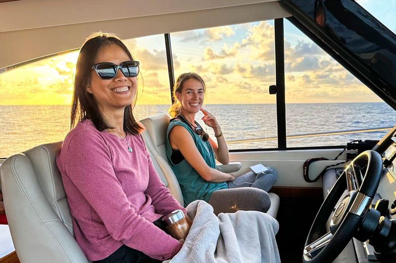 Lance's wife Caroline and their friend Quincey at the helm of their 525 SUV - photo © Riviera Australia