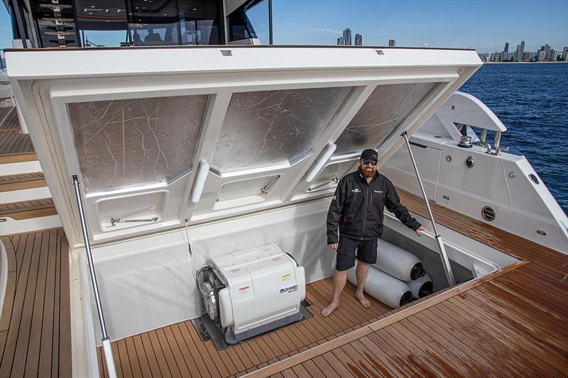 Isaac Marshall in the massive lazarette on board the new Maritimo S75 photo copyright John Curnow taken at  and featuring the Power boat class