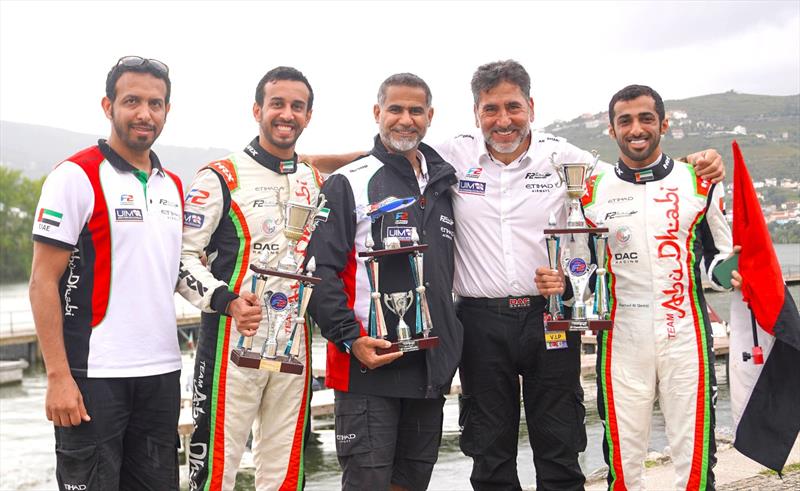 Rashed al Qemzi and Mansoor Al Thani celebrate with team manage Guido Cappellini and team-mates in Portugal last weekend - photo © Team Abu Dhabi