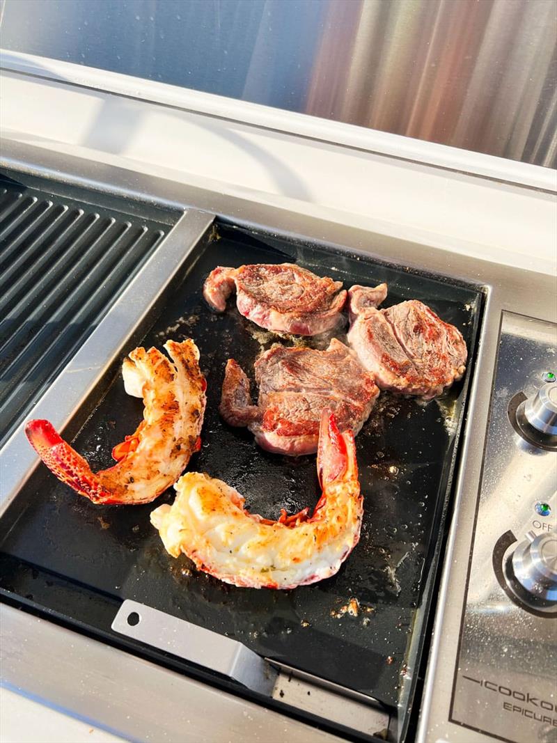 A surf-and-turf dinner on the 505's barbecue at Robe in South Australia - photo © Riviera Australia