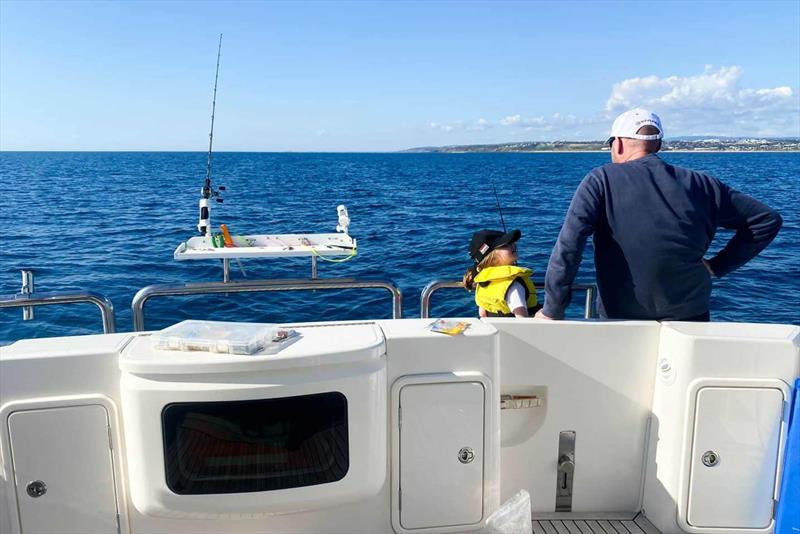 Kevin and grand-daughter share some special fishing time together - photo © Riviera Australia