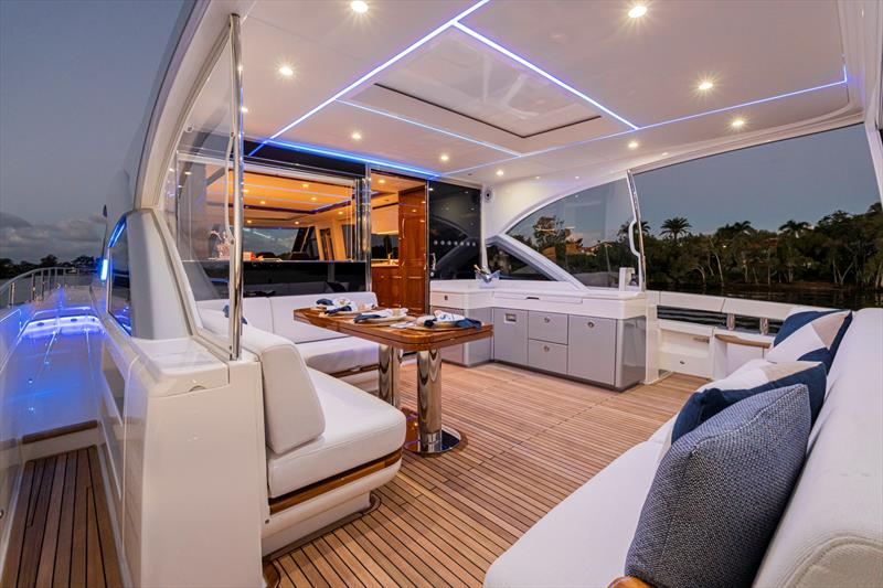 Aft Deck - Riviera's 6800 Sport Yacht has so many separate entertaining areas that family groups, friends and couples can all find their own space to enjoy the world around them photo copyright Riviera Australia taken at  and featuring the Power boat class