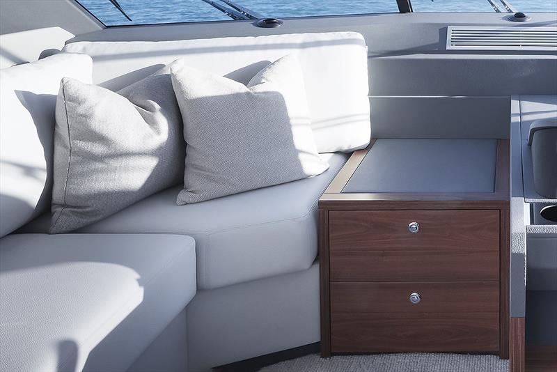 Crusing lounge on the bridge now has a coffee table with storage - Maritimo M600 Black Edition - photo © Maritimo