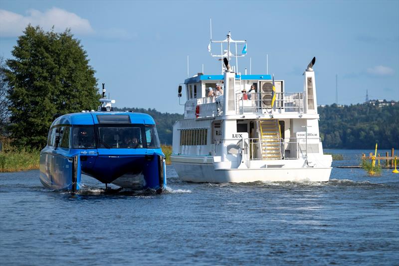 Candela P-12 next to the regular commuter vessel, the diesel-powered Lux photo copyright Candela taken at  and featuring the Power boat class