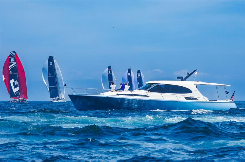 Palm Beach GT60 watching the TP52s racing photo copyright Palm Beach Motor Yachts taken at  and featuring the Power boat class