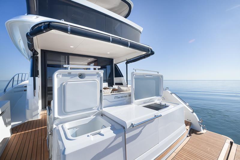 The 'boot' with access to the lazarette and fridge and grill - Maritimo M50 - photo © Maritimo