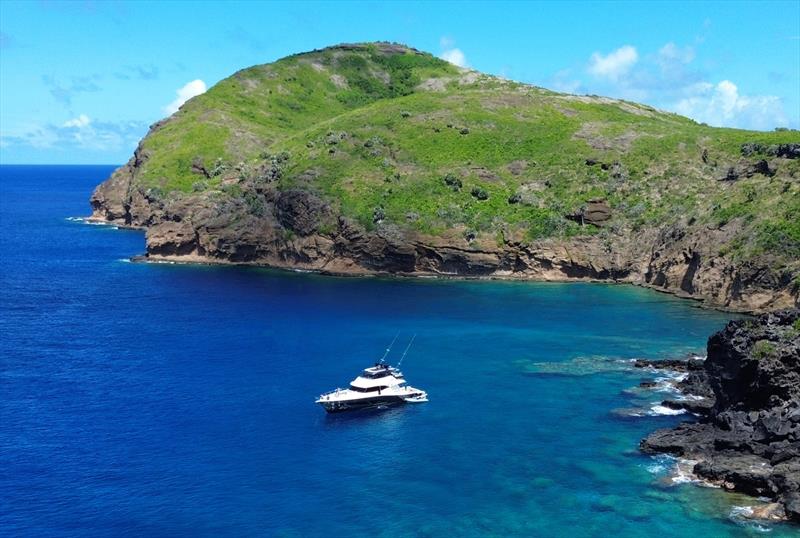 Anchored in the island's lee in crystal-clear waters that are perfect for snorkelling - photo © Riviera Australia