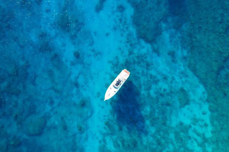Fishing near the Albion Cliffs, offering stunning views of dramatic rock formations - photo © Riviera Australia