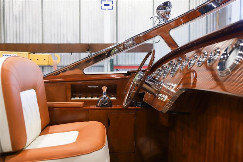 Marine leather, mahogany and the hand-cast, rose-polished steel windscreen meet at the helm - photo © J Craft Boats