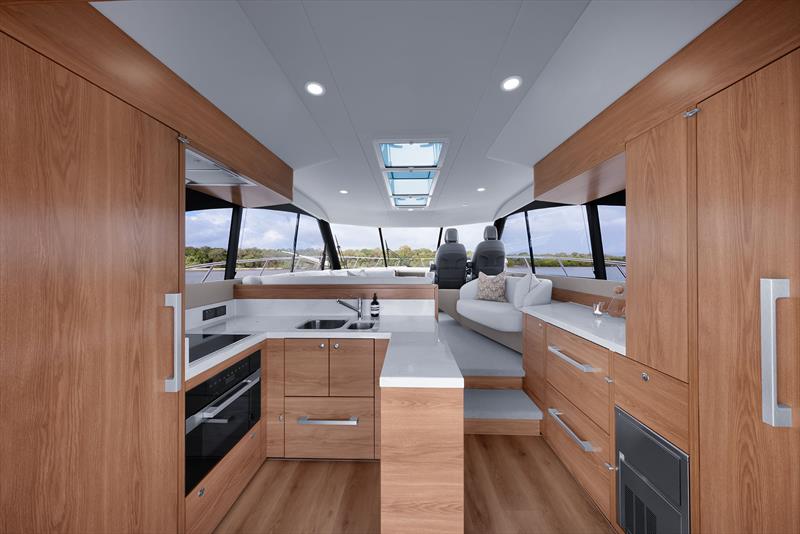 Galley on the left with the S50 - this is the modern and cool Light Oak of Hull #1 - photo © Maritimo