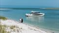42 Couple anchored close to shore