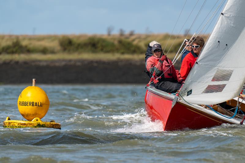 Royal Burnham One Design boat rounds the Rubberball mark during the second day of Burnham Week 2024 photo copyright Petru Balau Sports Photography / sports.hub47.com taken at Royal Corinthian Yacht Club and featuring the Royal Burnham One Design class