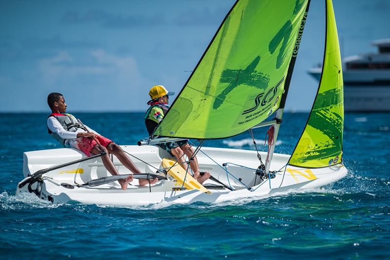 45th St. Maarten Heineken Regatta Day 3: The Next Generation racers had a chance to share the race course with the big boats out in Simpson Bay photo copyright Laurens Morel / www.saltycolours.com taken at Sint Maarten Yacht Club and featuring the RS Zest class