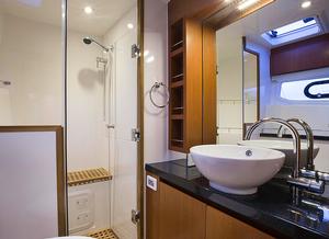 The head in the Owner's Stateroom photo copyright Multihull Central taken at  and featuring the  class