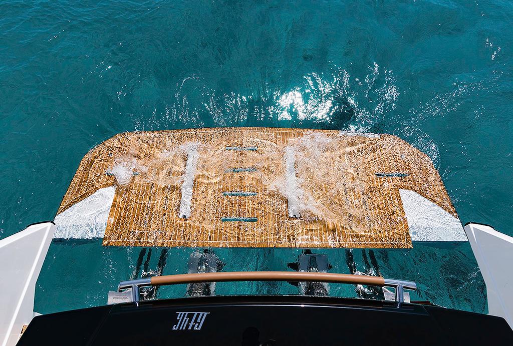 Hydraulic swim platform of the GT46 down. Photo Credit: Nicolas Claris &copy; Beneteau http://www.beneteau.com/