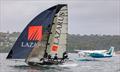 18ft Skiff NSW Championship Day 2 - Lazarus outpaces a plane © SailMedia