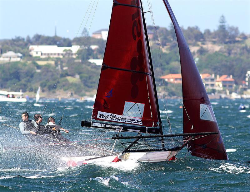 Nick Press looks back to check on the opposition photo copyright Frank Quealey taken at  and featuring the 18ft Skiff class