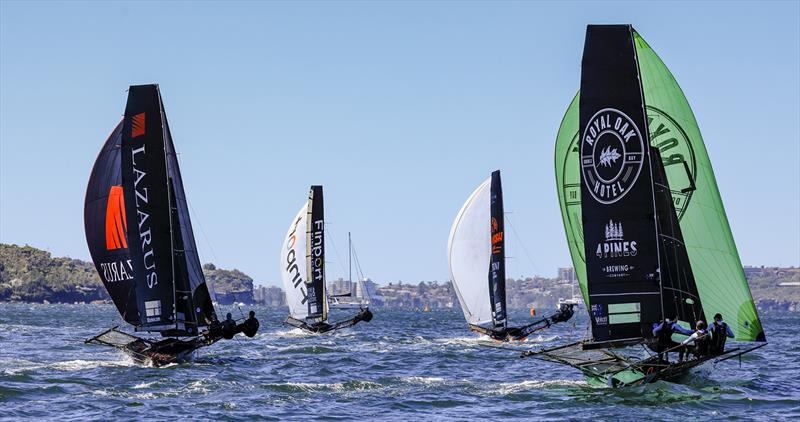 Spinnakers on the run to Obelisk - 2024-25 Australian 18 Footers League Club Championship - photo © SailMedia