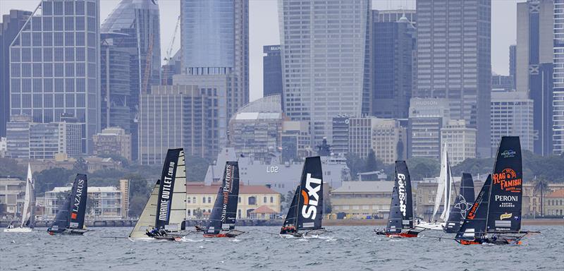 Fleet works to the weather mark at Clark Island - 18ft Skiff Club Championship photo copyright SailMedia taken at Australian 18 Footers League and featuring the 18ft Skiff class