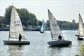 Second-placed John Wilkey (2041) and class winner Nick Titley (2527) silhouetted against the Sunday morning sun - Minima Regatta 2024 © Eileen Barry