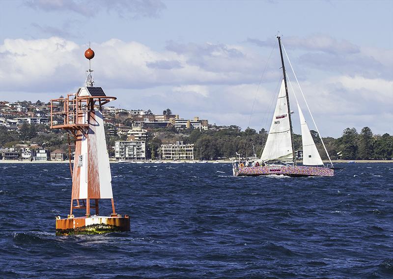 Lisa Blair out on Sydney Harbour doing some heavy weather practice with some guests on board photo copyright John Curnow taken at  and featuring the Solo class